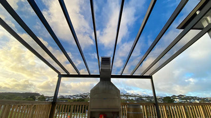 pergola roof over outdoor oven and deck